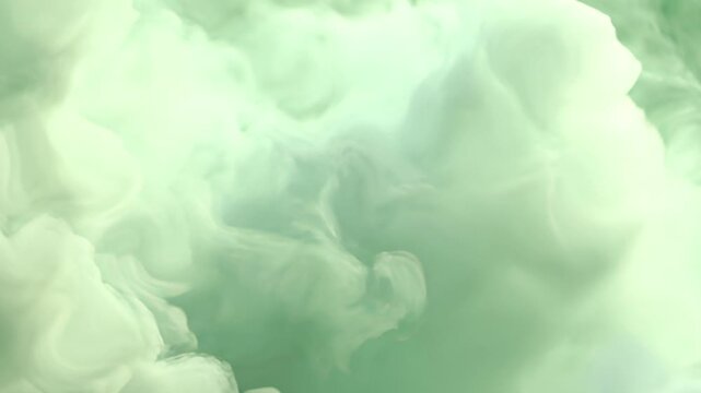 abstract green smoke or mist effect, often used as a digital background or texture. 