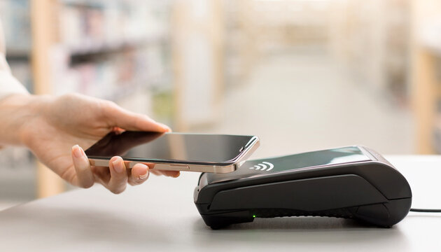 Contactless payment tap, POS machine close-up, Card payment, credit card and debit carda