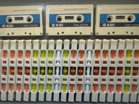 Stack of old compact cassettes. A close-up of a row of old audio tapes from the Orwo-Wolfen film factory in the former German Democratic Republic. Bitterfeld-Wolfen, former GDR, Germany.