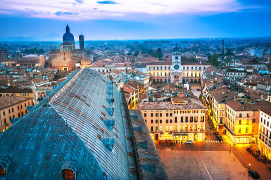 Padova, Italy. Piazza della frutta historic square and landmarks of Padova evening view from Torre degli Anziani tower