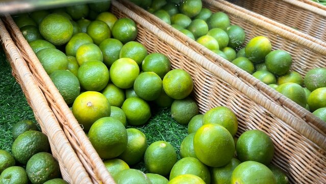 Green lime inside basket