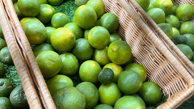 fresh limes in a basket