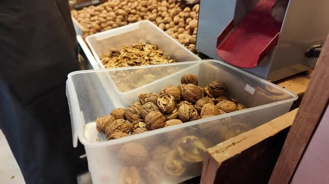 Automatic Walnut Cracker Machine Working in a Grocery Store