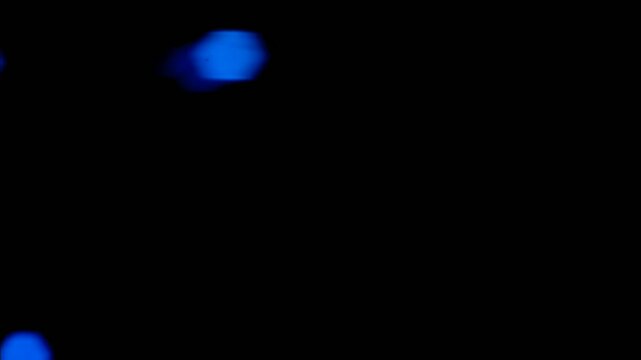 A simple video player interface displays the prompt "Double Tap to Add Text" in white. Blue bokeh lights add a soft, blurred effect to the dark background.