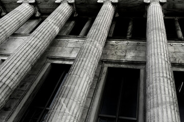 Fototapeta premium Columns on Old Building for Architecture and Design Library Courthouse or Government Building