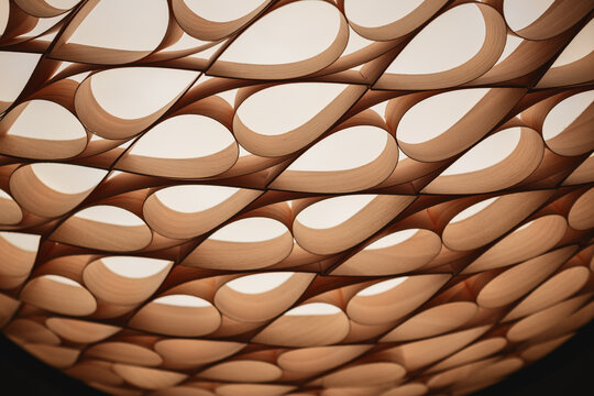 Abstract wood structure forming a repeating drop pattern