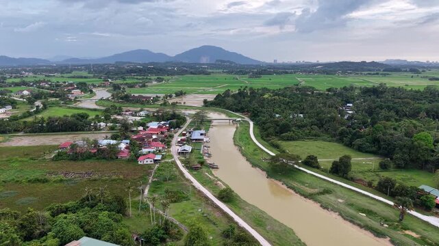 Drone View Labuh Banting River Village And Rice Fields