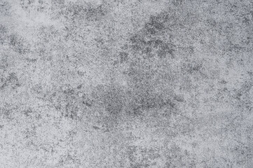 Fototapeta premium A blank gray concrete texture in a loft-style setting against a neutral background.