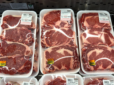 Trays of USDA Prime grade boneless beef ribeye steaks