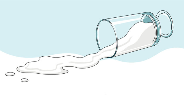 Glass bottle tipped over with white milk spilling out onto a light blue surface creating a large puddle.