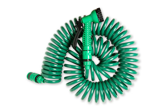 green spiral hose with spray gun isolated