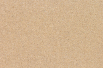 Fototapeta premium Smooth brown cardboard paper texture background. Blank recycled kraft sheet surface for rustic eco friendly packaging design