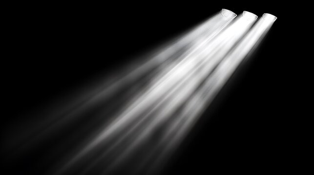 Three intense white spotlights cast dramatic, sharp diagonal beams of light through a smoky atmosphere, creating an impactful and theatrical illumination against a dark, isolated black background.