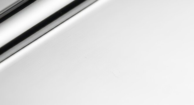 Close-up macro view of polished platinum metal surfaces, emphasizing the pristine white luster and industrial strength used for fine luxury settings, strength, valuable, opulent