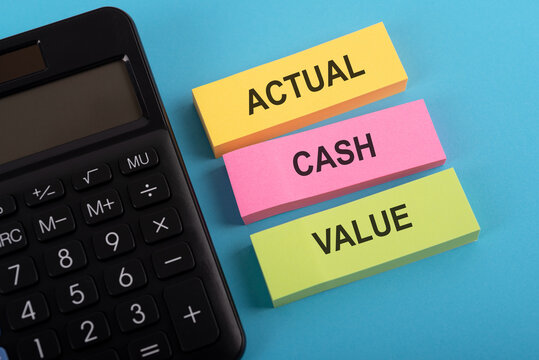 Calculator and text Actual Cash Value business concept
