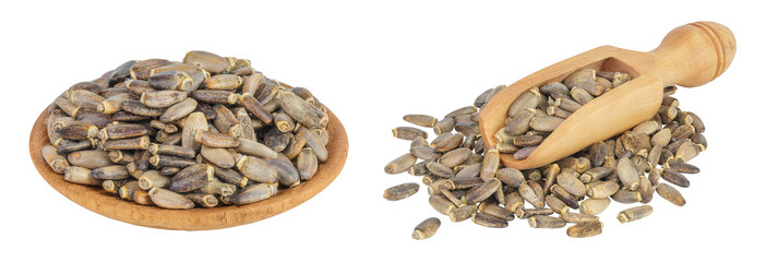 Seeds of a milk thistle or Silybum marianum, Scotch Thistle, Marian thistle in wooden bowl isolated...