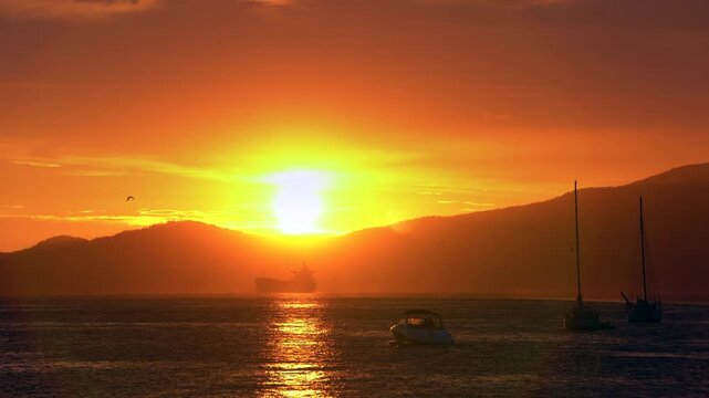 Kitsilano Sunset Summer Boat Cruise English Bay 4K UHD. Motorboat cruise on English Bay at sunset, Vancouver, Canada. 4K. UHD.
