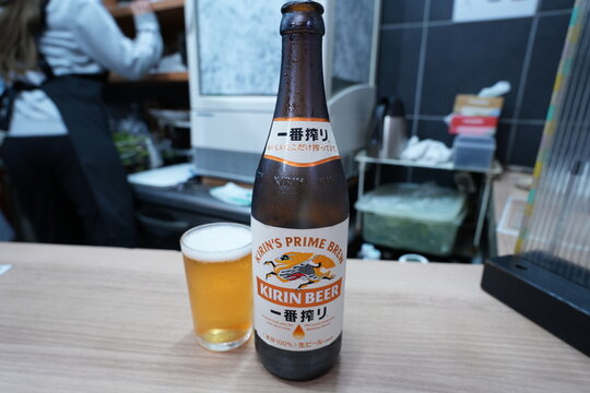 Premium Japanese Bottled Beer, Chilled lager beer bottle with a gold label, KIRIN ICHIBAN - 日本の瓶ビール キリン 一番搾り