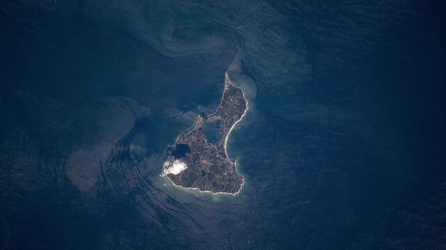 Rotating flying over Block Island Rhode Island satellite view from space based on Nasa imagery