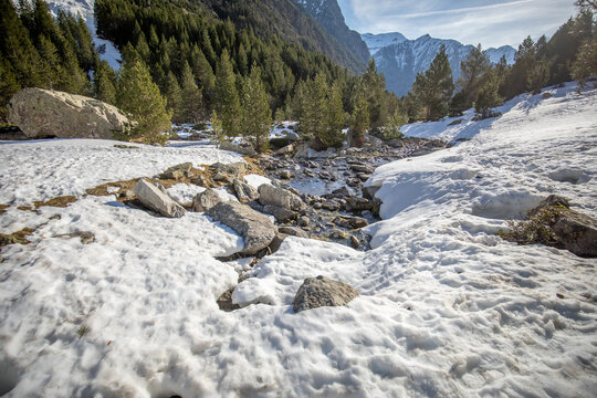 View of the snow-capped Barrosa Valley, Huesca, Aragon, Spain, on a spring day