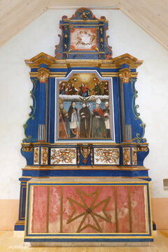 Baroque chapel of La Gruvaz after restoration. Baroque altarpiece in blue and gold dominates the renovated chapel interior beautifully.  Saint Gervais.  France.