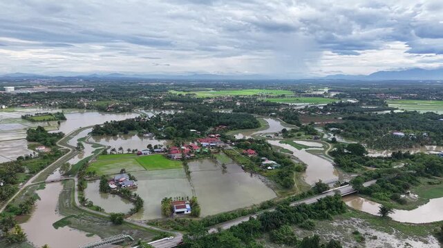 Labuh Banting green rice paddies river delta panorama