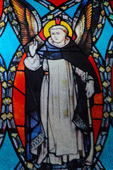 Obraz premium Catholic Dominican church. Stained glass. Saint Vincent Ferrer (1350–1419) was a Dominican preacher, canonized in 1455. Ho Chi Minh city. Vietnam.