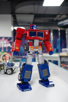 Robosen Flagship Optimus Prime auto-converting robot on display. Advanced Transformers programmable robot toy.