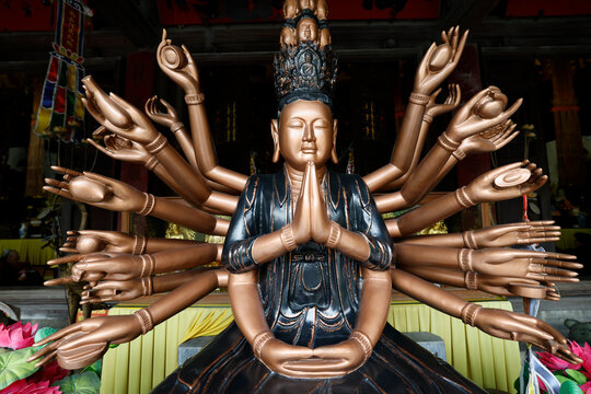 Phuc Lam Du Pagoda.  Magnificent multi-armed Avalokitesvara bodhisattva with stacked faces. Haiphong. Vietnam.
