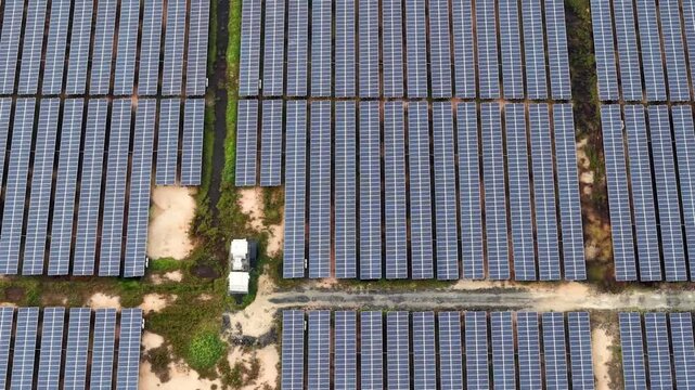 Aerial Solar Panel Outdoor voltaic Farm Rows and Inverters