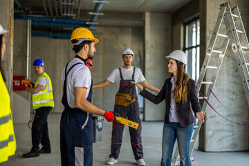 Angry Female Architect Shouting at Construction Workers on Site