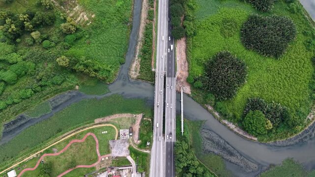 Aerial drone view of Sungai Juru river bridge and surroundings