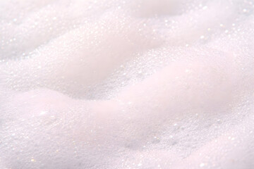 Obraz premium White soap foam texture background with soft bubbles for cosmetic and hygiene concept