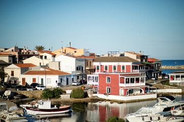 Obraz premium old dock of Stintino in the Porto Vecchio now transformed into a restaurant, Sardinia, Italy