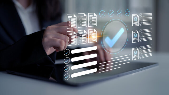 A business professional engages with digital documents on a tablet, showcasing the intersection of technology and productivity in a modern office setting. Gantry