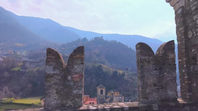 Alps through the battlements of Castlegrande, Bellinzona, Switzerland