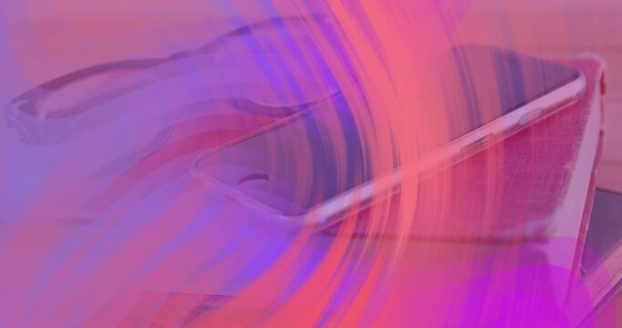 Swirl emerging lower right, sending pink arcs sweeping over phone on pads, accenting scene