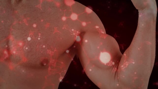 Vertical video: Male model lifting and flexing arm, red particles accenting bicep for fitness