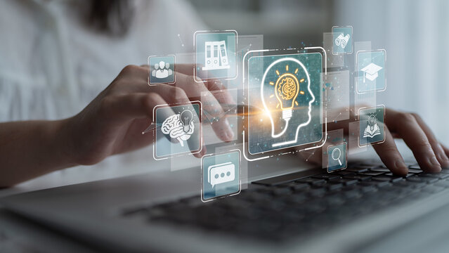 Hands Typing on Laptop with Digital Brain Icons and Learning Symbols for Educational Technology and Innovative Ideas Concept Sigmoid