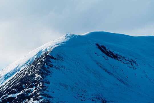 Heidalsmuen Mountain seen from the County Road 255 between Vinstra and Sk&aring;bu, Norway, April 2026.