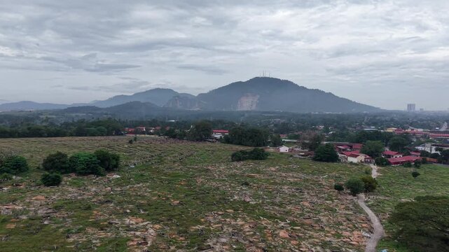Aerial drone footage over chinese cemetery kubang semang malaysia