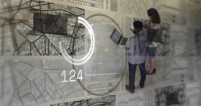 Man using laptop and woman viewing tablet, starting biz holo map rotating ring and analyzing data