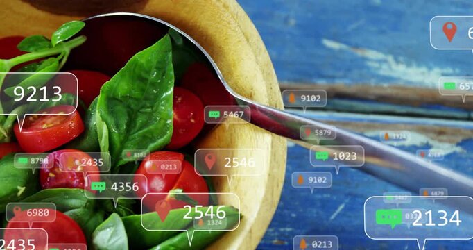 Wooden bowl halved tomatoes, basil zooming in, spoon crossing sparking bubbles moving over bowl ads