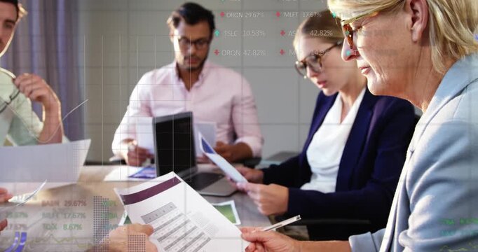Team comparing charts in business, man opening tablet flipping pages, overlays marking graphs