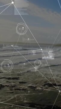 Vertical video: On load sea and shore holding back as HUD overlays animating right for marine tech