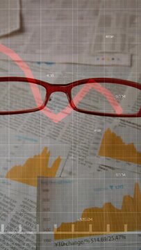 Vertical video: Red glasses entering frame, sliding and tilting over charts, HUD highlighting trend