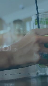 Vertical video: Friend hand reaching for glass at cafe, lifting with overlays to share drink