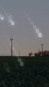 Vertical video: Streaming binary overlay descending over farm sky above wind turbines, sun dimming