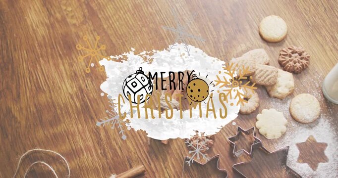 Animation of christmas greetings text over christmas cookies and decorations