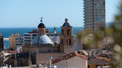 Alicante city skyline with church dome and sea Spain travel © Ruslan MN